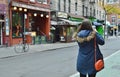 Tourist Woman Taking Picture in NYC Mac Dougal Street Manhattan Greenwich Village