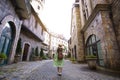 Tourist woman is traveling inside French village on Bana Hills in Danang