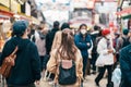 Tourist woman visit Ameyoko market, a busy market street located in Ueno. Landmark and popular for tourist attraction and Travel