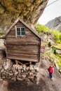 Tourist visiting Helleren houses in Jossingfjord, Norway Royalty Free Stock Photo