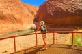 Woman looking Uluru Waterhole