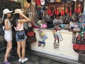 Tourist women at souvenir stall at Monte Fort park, Macau