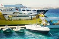 Tourist yachts and boats near the pier in Hurghada. Egypt.