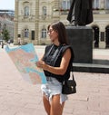 Tourist 2. A young smiling lady with glasses. Novi Sad Royalty Free Stock Photo