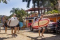 Tourist heading for a paddle board session in Sayulita Beach in Mexico