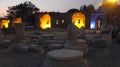 Touristic Apollon Temple in Side, Antalya, Turkey, Evening shot with special lightings, people are walking, sitting, and taking ph