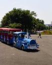 Touristic attraction - mini train transporting tourists in the sea garden