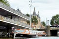 Touristic boat in a canal in Amsterdam