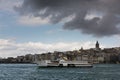 Touristic boats in Golden Horn bay of Istanbul and view on Galata tower Royalty Free Stock Photo