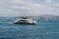 Touristic boats in Golden Horn bay of Istanbul and view on Suleymaniye mosque, Turkey Royalty Free Stock Photo