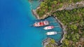 Touristic boats in the sea, top view.