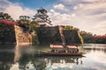 Touristic boats with tourists along the moat of Osaka Castle, Osaka, Japan Royalty Free Stock Photo