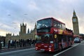 London, United Kingdom - December 2023 - Photo of the double deck bus on the bridge and the Palace of Westminster and Big Ben Royalty Free Stock Photo