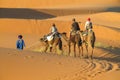Touristic camel caravan in desert Royalty Free Stock Photo