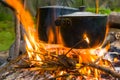Touristic cauldron on camp fire