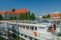 Touristic cruise ship waiting for passengers on the river