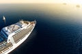 Touristic cruise ship in the waters of mediterranean sea at sunset