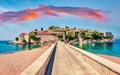 Touristic face of Montenegro - Sveti Stefan, small islet and 5-star hotels resort on the Adriatic coast. Fantastic morning seascap