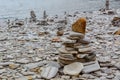 Touristic pyramid balanced stack of stones at the beach Royalty Free Stock Photo