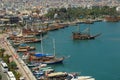 Touristic sailboats setting off to the Mediterranean sea in the ancient port of Alanya city. Antalya, Turkey.