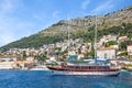 Touristic ship by the shore in Dubrovnik in Croatia Royalty Free Stock Photo