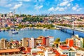 Touristic sightseeing ships in Golden Horn bay of Istanbul and mosque with Sultanahmet district against blue sky and clouds. Royalty Free Stock Photo