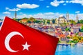 Touristic sightseeing ships in Golden Horn bay of Istanbul and mosque with Sultanahmet district against blue sky and clouds. Royalty Free Stock Photo