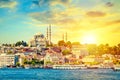 Touristic sightseeing ships in Golden Horn bay of Istanbul and view on Suleymaniye mosque with Sultanahmet district against Royalty Free Stock Photo