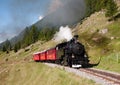 Touristic Steam Train In Alps In Switzerland