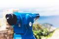 Touristic telescope look at the city Barcelona Spain, close up metal binoculars on background viewpoint overlooking the mountain Royalty Free Stock Photo