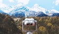 Touristic telescope look at the city with view snow mountains, closeup metal binocular on background viewpoint observe vision