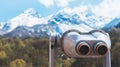 Touristic telescope look at the city with view snow mountains, metal binocular on background viewpoint observe vision, closeup Royalty Free Stock Photo