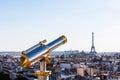 Touristic telescope overlooking Eiffel Tower from the roof of Pr