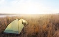 Touristic tent among a prairie at the early morning Royalty Free Stock Photo
