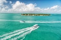 Touristic yachts floating by green island at Key West, Florida Royalty Free Stock Photo