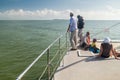 Tourists aboard modern catamaran in French Guiana