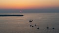 Tourists aboard the sunset cruise yachts enjoying a sunset Royalty Free Stock Photo