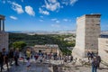 Tourists in the Acropolis Propylaea with Athens panorama background