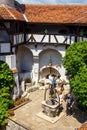 Tourists admire the Bran Castle also know as Dracula Castle near Brasov, Romania. Royalty Free Stock Photo