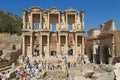 Tourists admiring ancient Greek and Roman Library Of Celsus at E