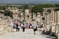 Tourists admiring ancient Greek and Roman Library Of Celsus at E