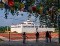 Tourists admiring Maya Devi Temple in Lumbini