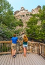 Tourists admiring the Mount Rushmore National Memorial Sculpture