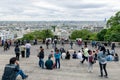 Tourists admiring the skyline of Paris from the Sacre Coeur Royalty Free Stock Photo