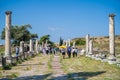 Tourists in the ancient city of Asklepion. Via Tecta, the Roman sacred street leading to the Asklepion in Roman city Pergamon.