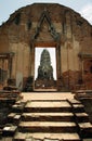 Tourists in ancient ruins of Hindu temple in Ayutthaya