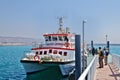 Tourists approached passenger boat at pier, Iranian Island of Ho Royalty Free Stock Photo