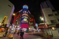 Tourists around the famous Don Quijote retail store