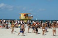 Tourists around a lifeguard stand on South Beach in Miami Royalty Free Stock Photo