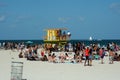 Tourists around a lifeguard stand on South Beach in Miami Royalty Free Stock Photo